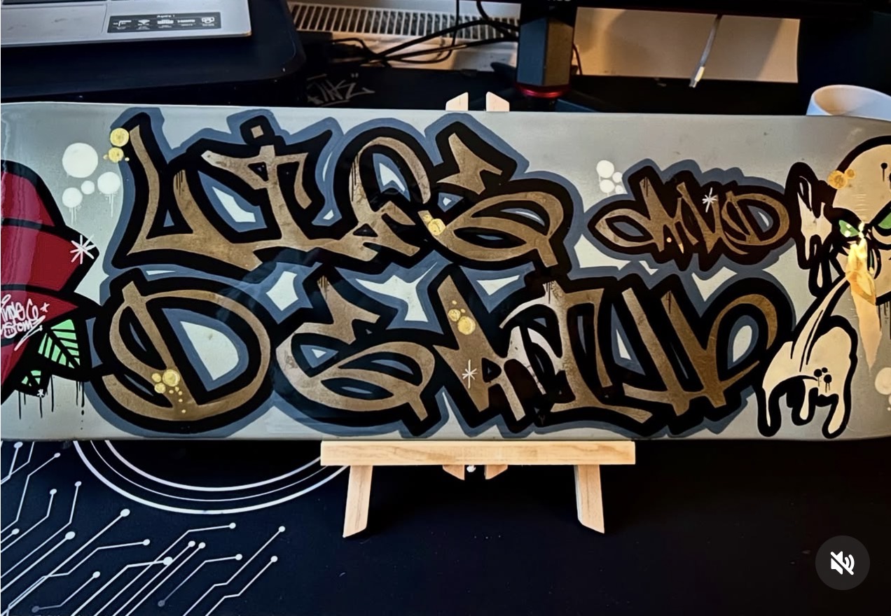 Bronze graffiti custom skateboard