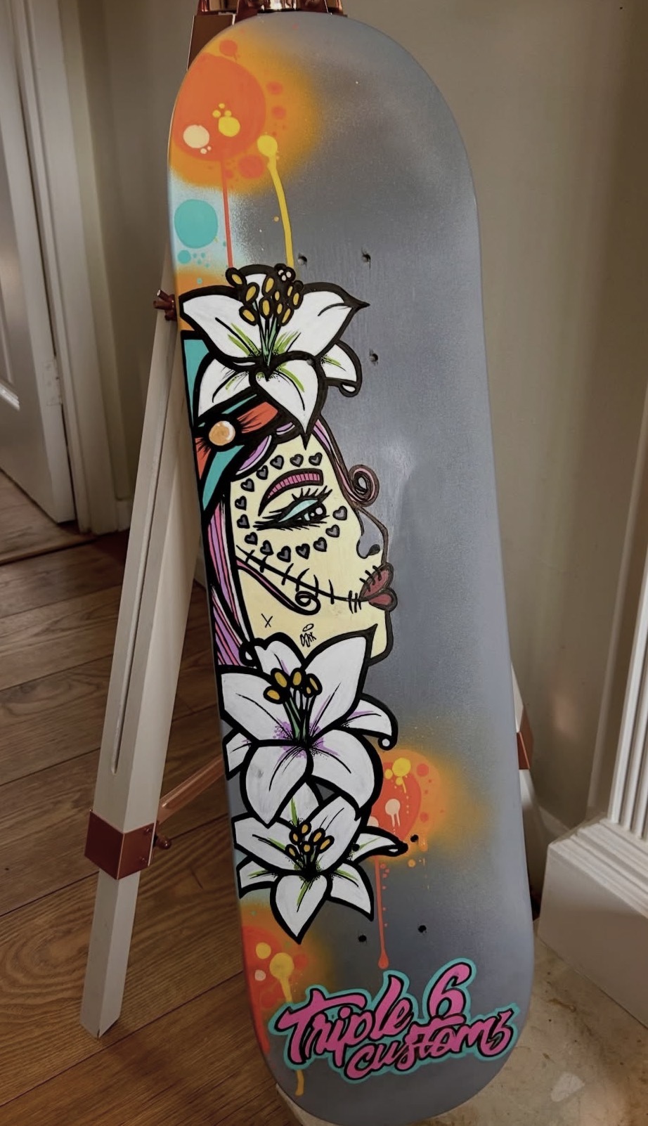 Floral skull custom skateboard